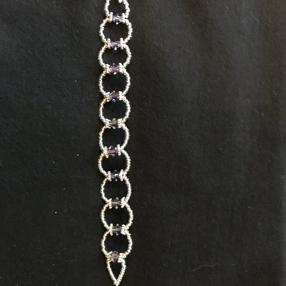 Handmade bracelet with beads and crystals.